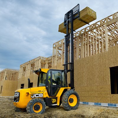 Forklift unloading machinery and industrial equipment in Potters Bar